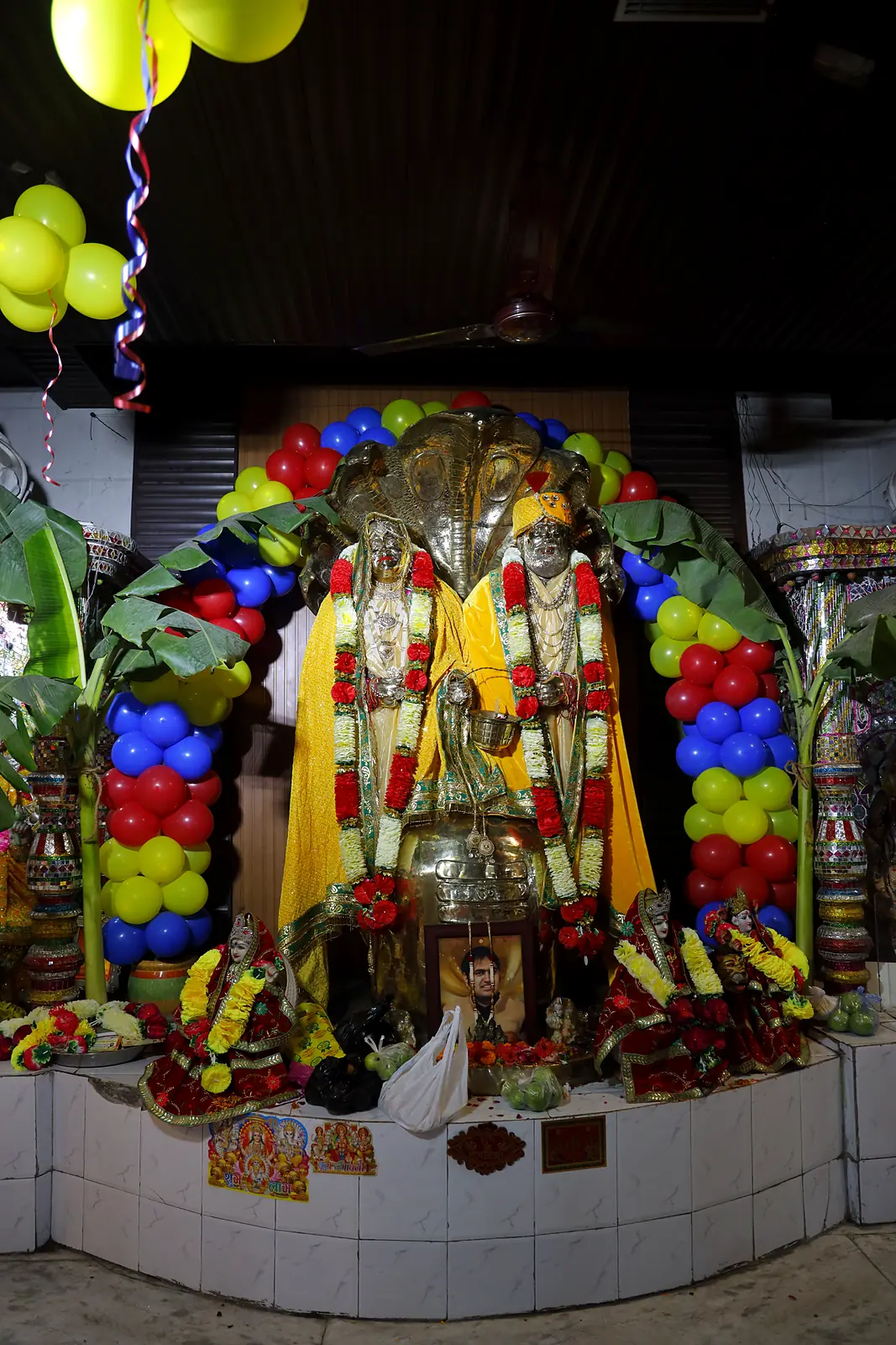 Shrine decorated with balloons and flowers