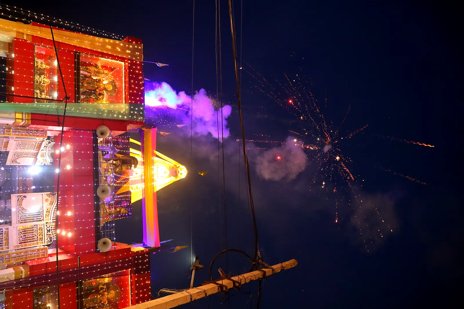Fireworks over the illuminated temple