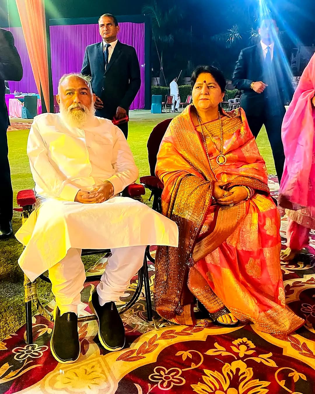 Guruji and Guru Maa at an evening utsav