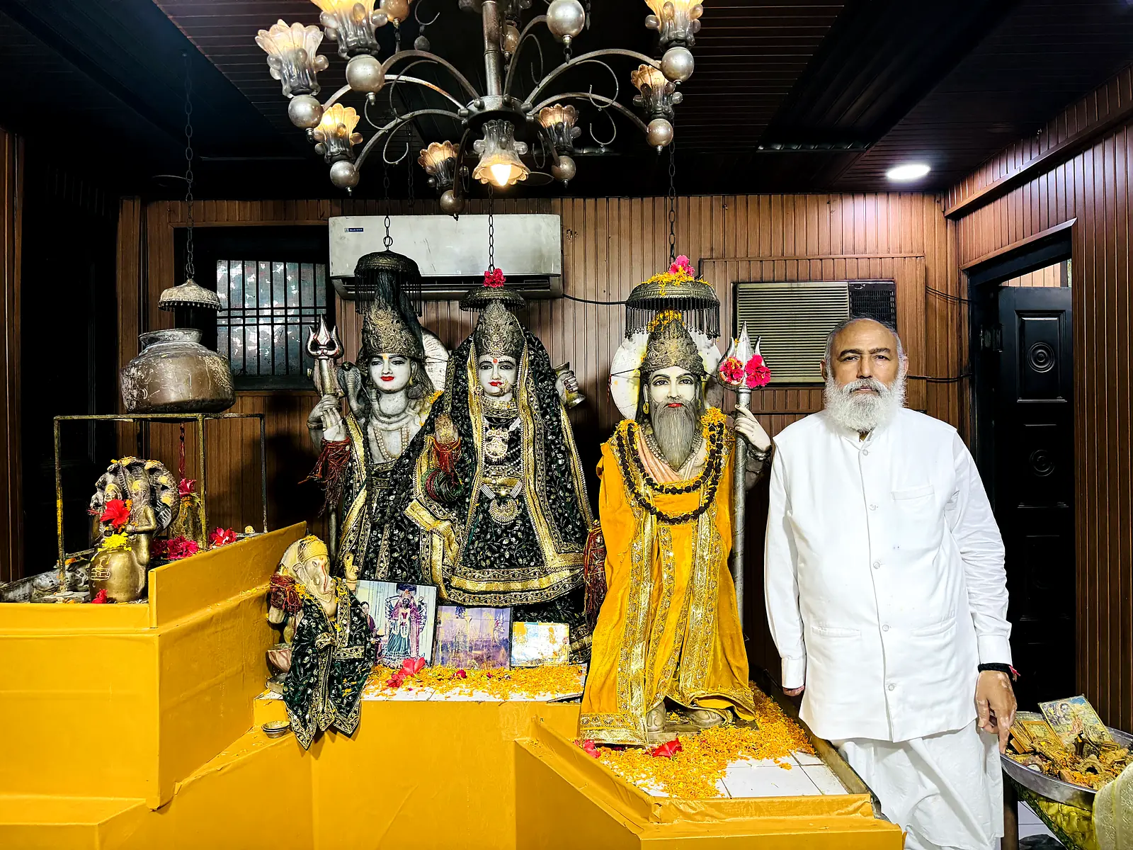 Guruji beside the temple murtis