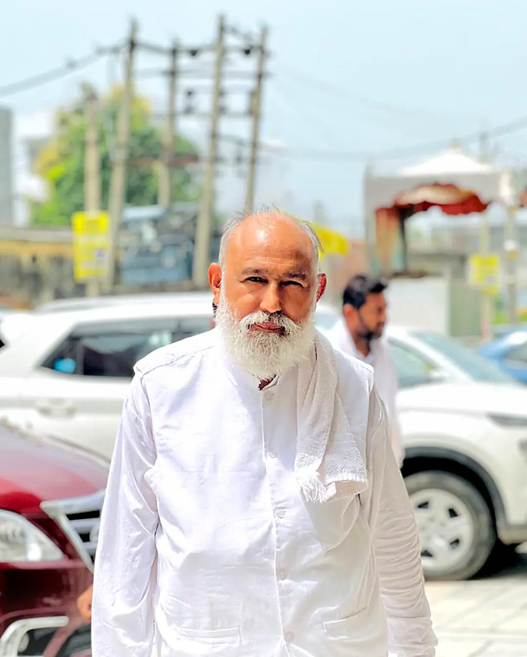 Guruji walking to the mandir
