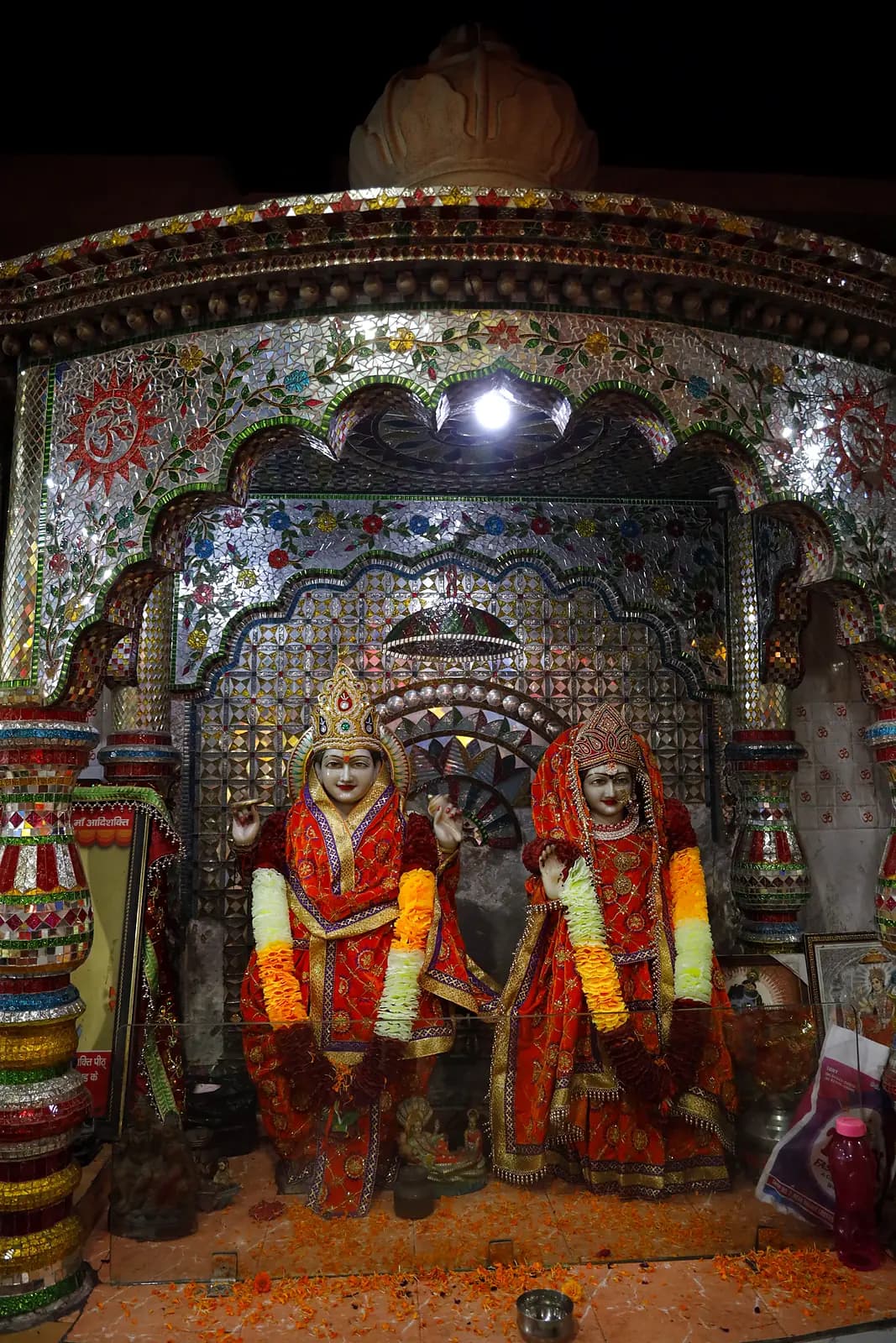 Divine couple in the mirror-work mandir