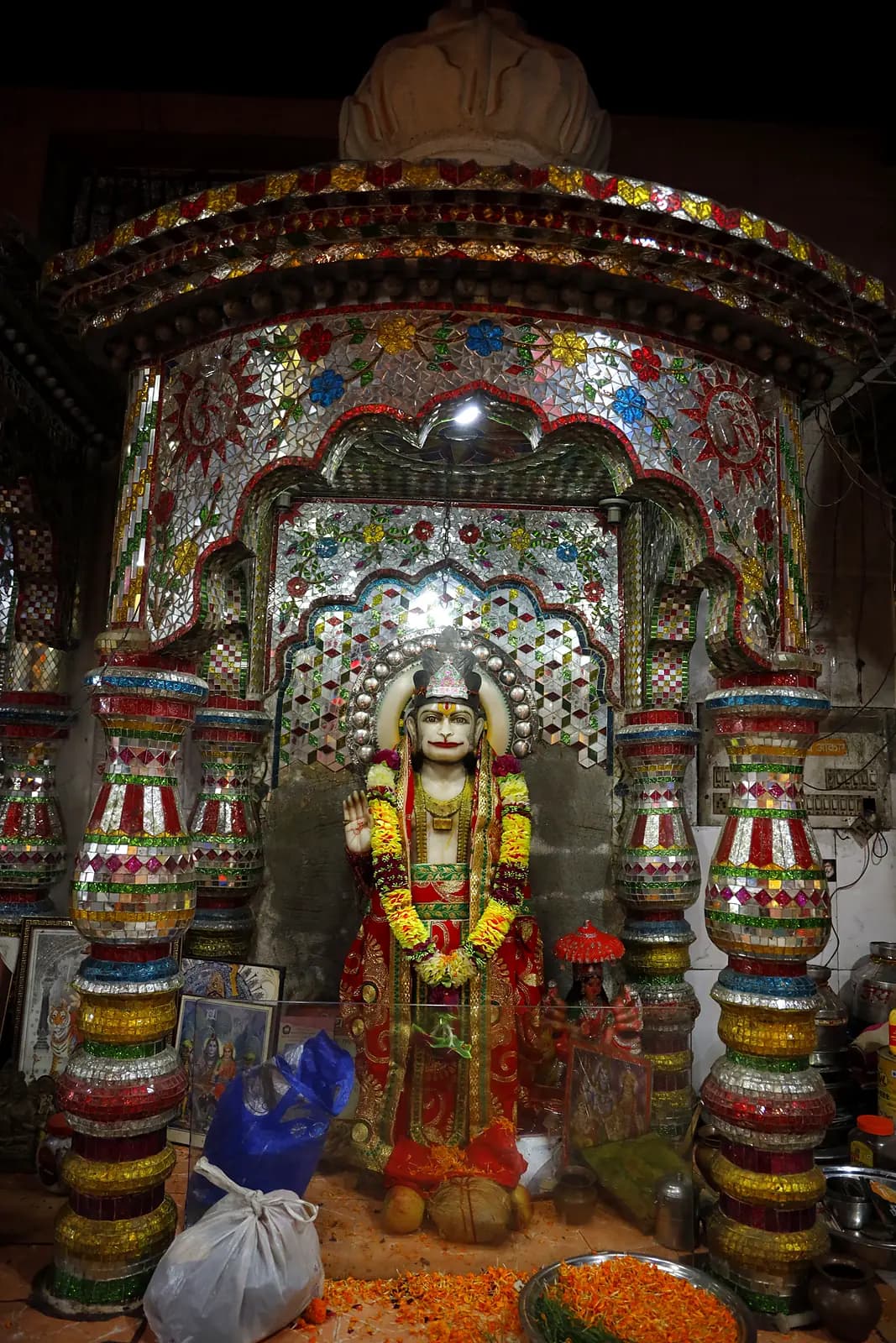 Murti in the mirror-work mandir