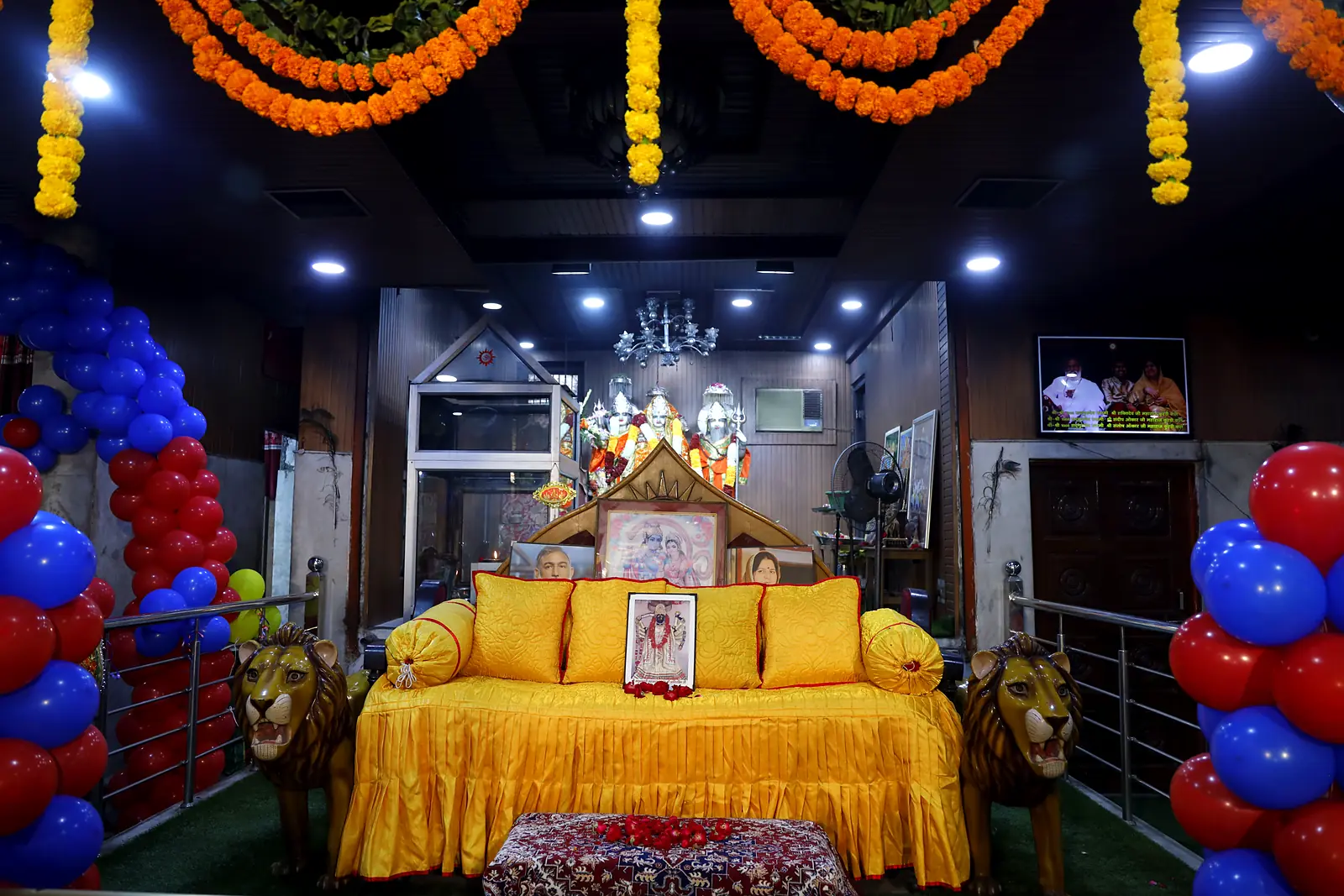 Golden simhasan with lion guardians