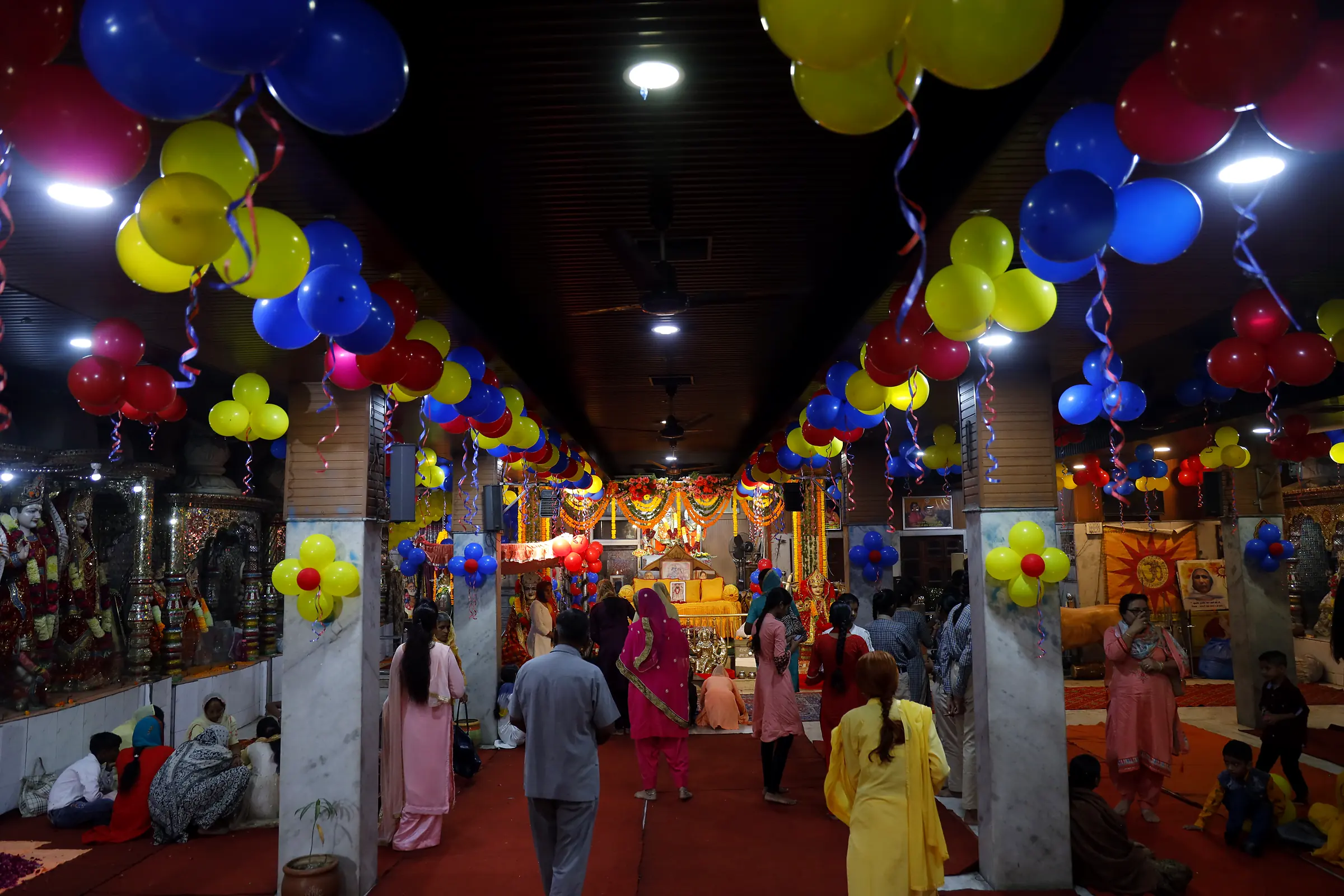 The main hall filled with devotees