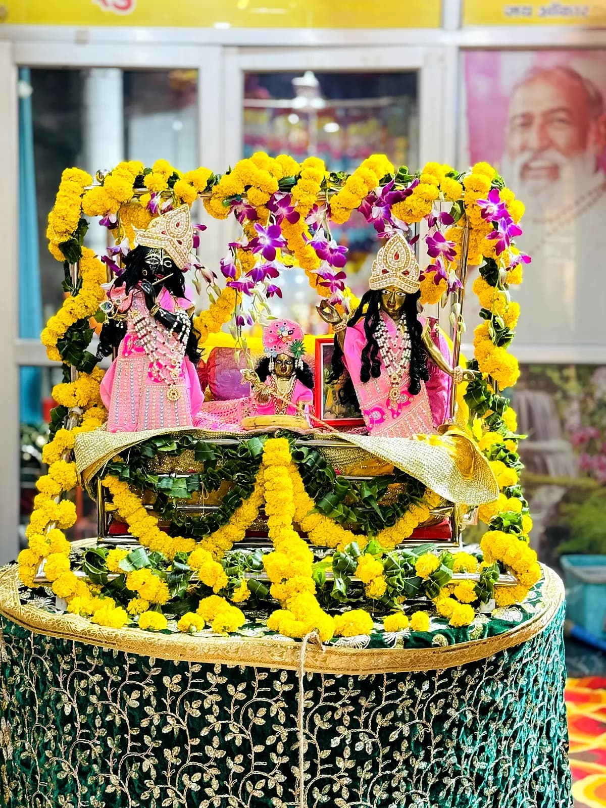 Radha-Krishna in a flower jhula