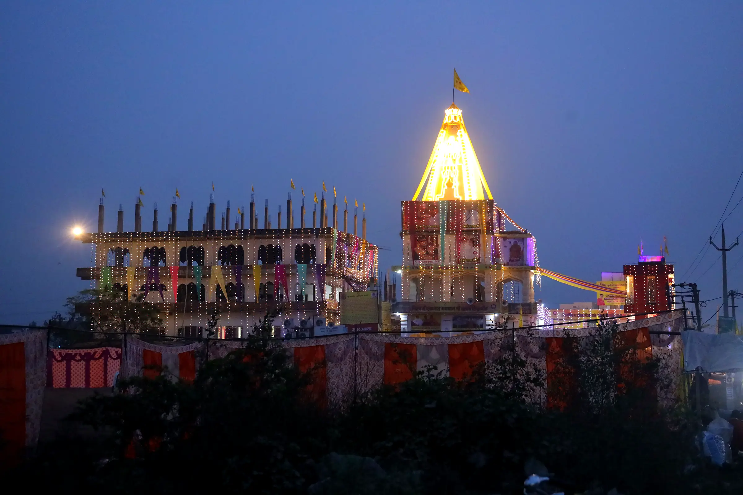 The golden shikhara glowing at dusk